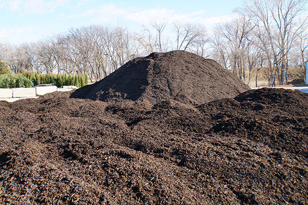 pile of wood mulch for wood waste recycling